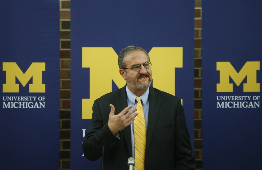 ANN ARBOR, MI - OCTOBER 31: University of Michigan President Mark Schlissel speaks at a news conference announcing the resignation of Michigan Athletic Director David Brandon in the Regents Room of the Fleming Administration Building October 31, 2014 in Ann Arbor, Michigan. Brandon has been under intense fire and scrutiny, particularly over the past weeks after Michigan’s quarterback Shane Morris suffered a concussion during the 2014 football season. Jim Hackett, who retired this year as CEO of Michigan-based furniture company Steelcase, has been named interim athletic director.