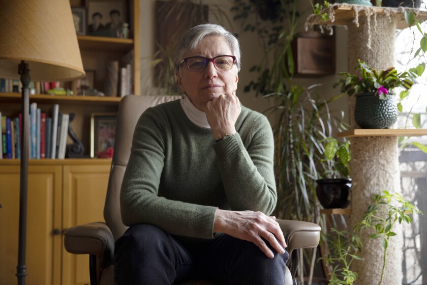 Rita Loch-Caruso, professor of toxicology emerita, poses for a portrait in her home on Tuesday, March 15, 2022 in Ann Arbor, Mich.