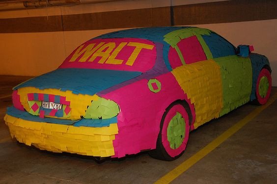 Office shenanigans: Post-it-covered cars